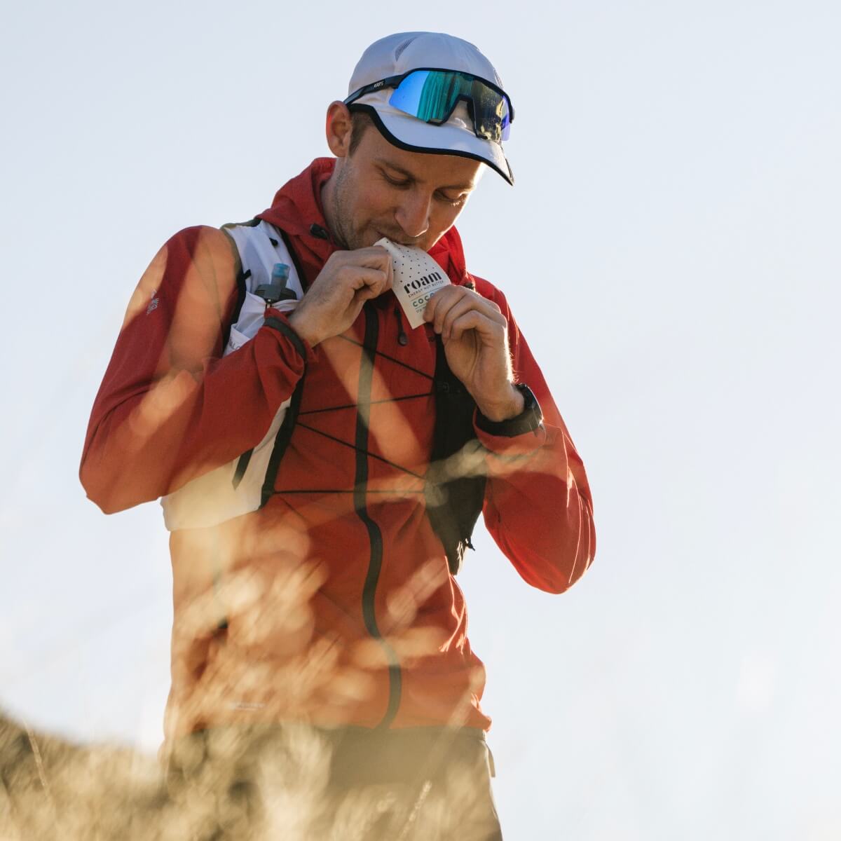 Athlete enjoying Roam Energy Nut Butter during a break in endurance exercise