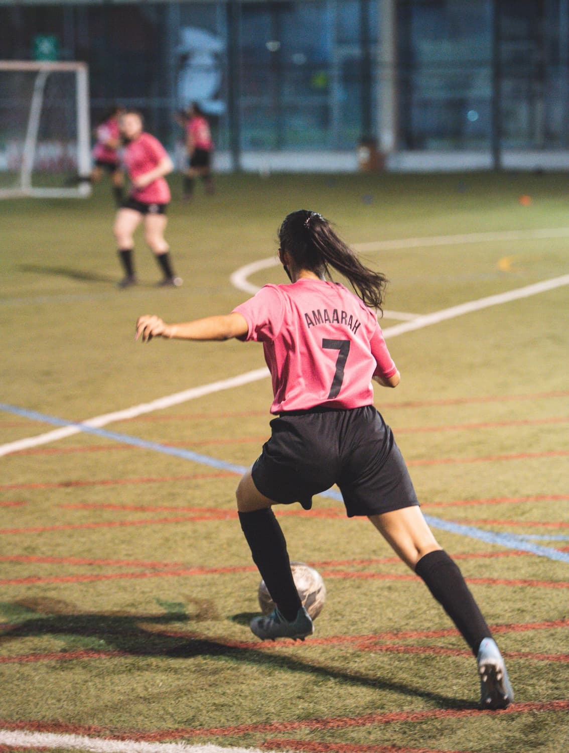 Female Teenagers Playing Soccer Roam